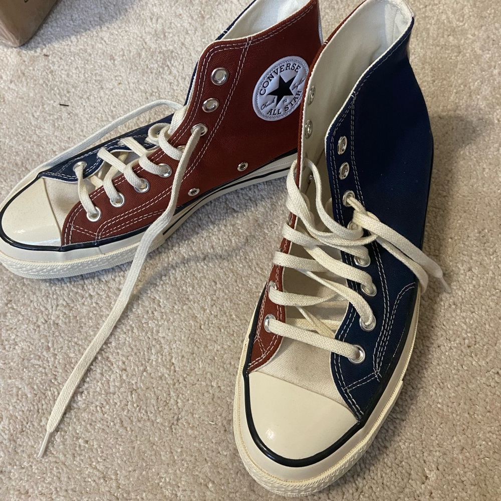 Two colored orange blue Converse High tops